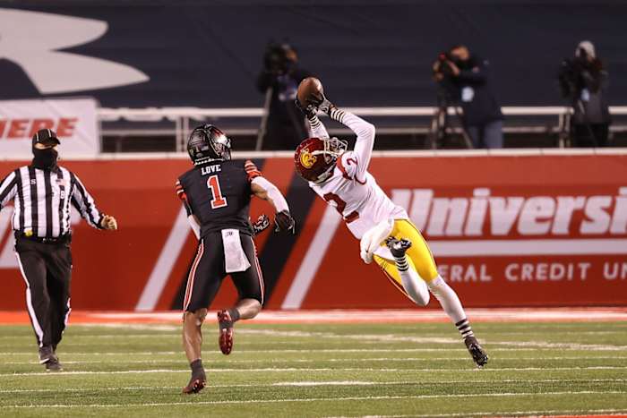 USC Trojans cornerback Olaijah Griffin (2) tries to intercept the ball during the second quarter against the Utah Utes at Rice-Eccles Stadium.